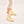 Bogota cream vegan boots for women worn on foot with neutral outfit highlighting fit and chunky sole