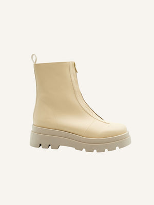 Bogota cream vegan boots for women in side view with chunky sole, sustainable fashion footwear