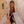 Woman wearing Cabo vegan lace up sandals with child walking together in Mediterranean street setting