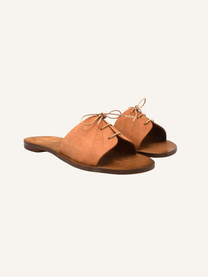 Angled view of Cali vegan sandals in cognac leather with rose lace detail shown as a pair on neutral background