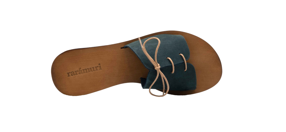 Top view of Cali vegan sandals in gravel blue with lace detail isolated on neutral background