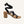 Side view of Camila Plus vegan lace up heels with black ribbons and cork block heel on neutral background