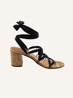 Side view of Camila Plus vegan lace up heels with black ribbons and cork block heel on neutral background