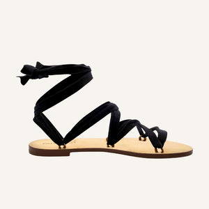 Capri black vegan lace-up ribbon travel sandals side view with flat sole and ankle ties