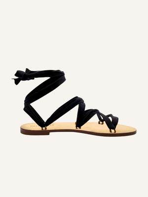 Capri black vegan lace-up ribbon travel sandals side view with flat sole and ankle ties