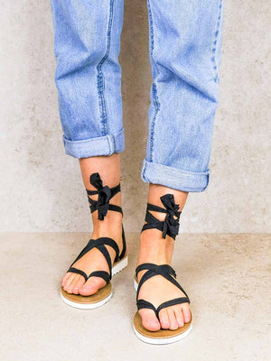 Chalco black vegan lace-up ribbon travel platform sandals on-foot front view with ankle ties