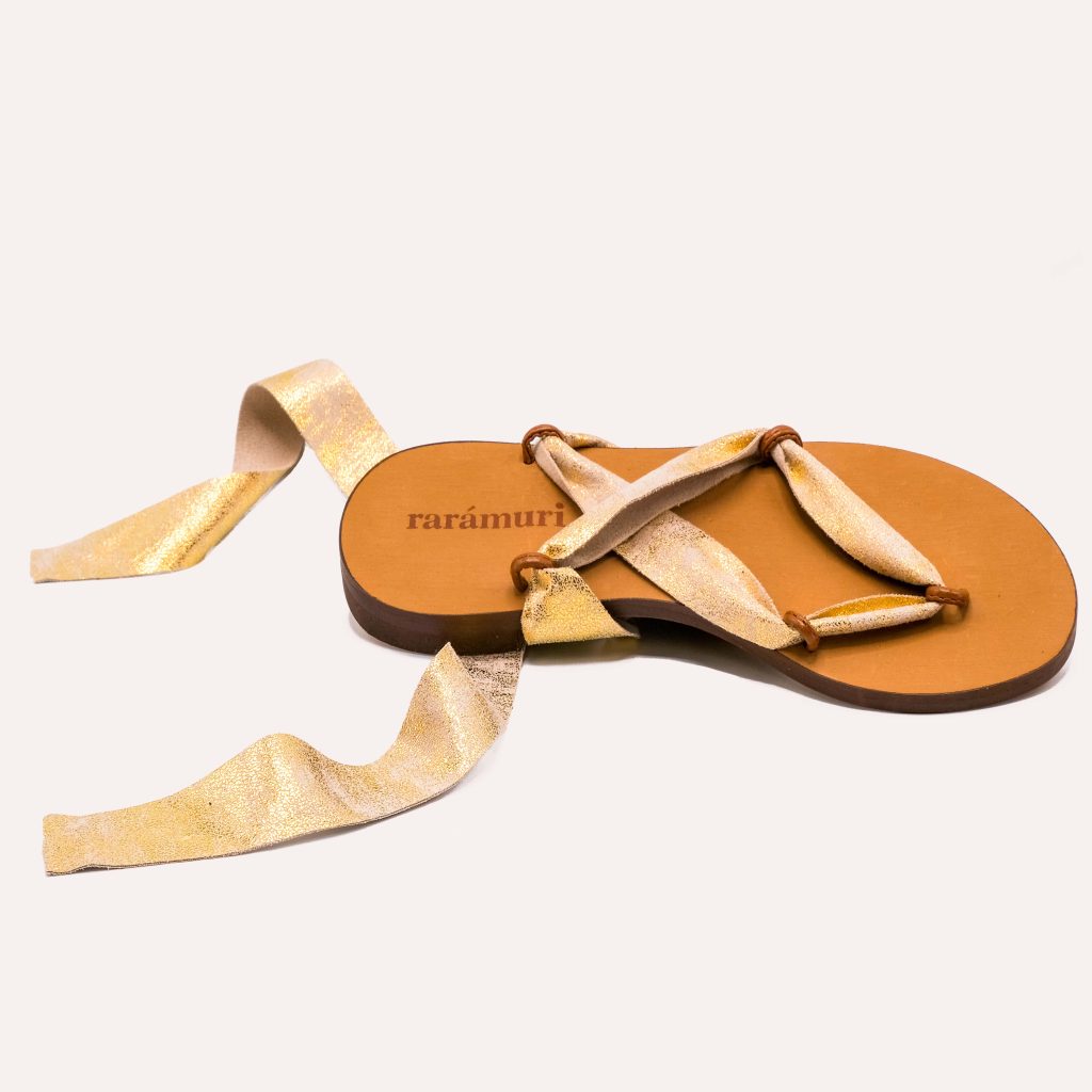Elegant sandals with champagne-gold satin ribbons, adding a touch of luxury.